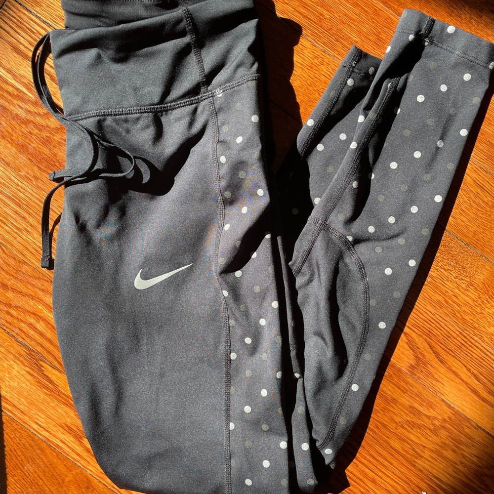 Nike black leggings with white polkadots on the side